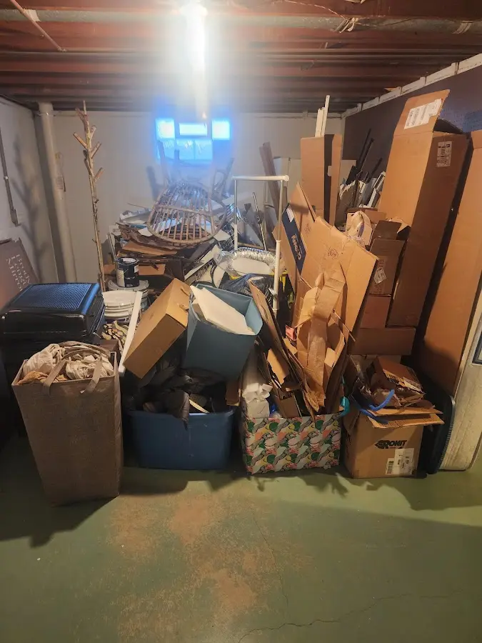 Roll-off dumpster container at job site for 4 Yard Dumpster Rental in Thornapple